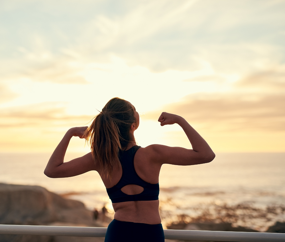 Woman exercising at home, showing a healthy daily workout routine.