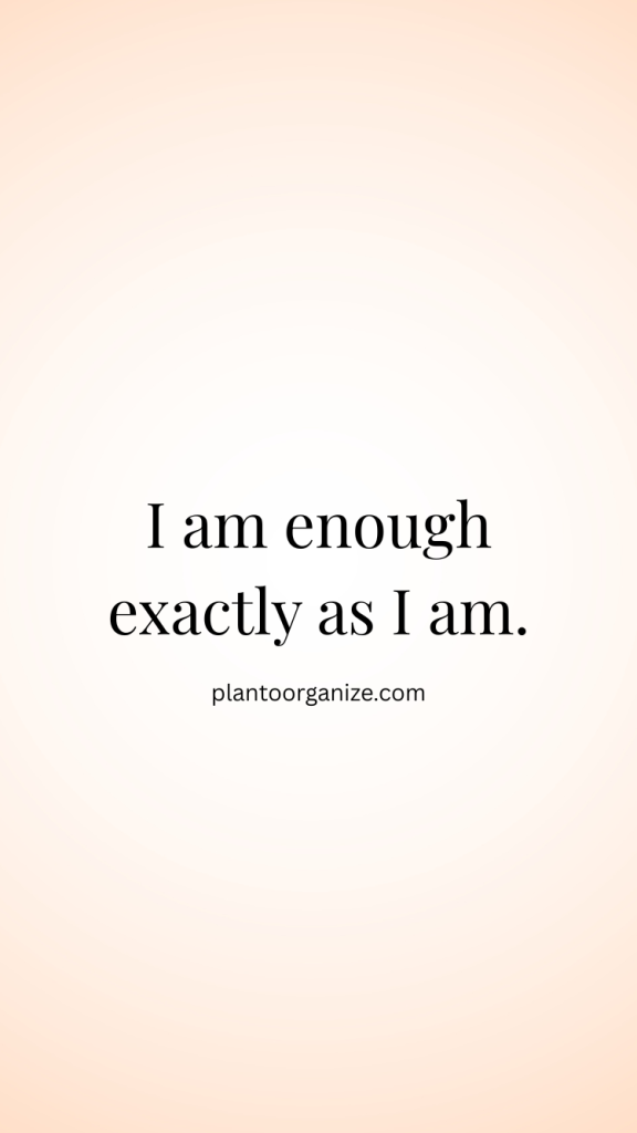 Cup of coffee next to a notebook filled with empowering daily affirmations.