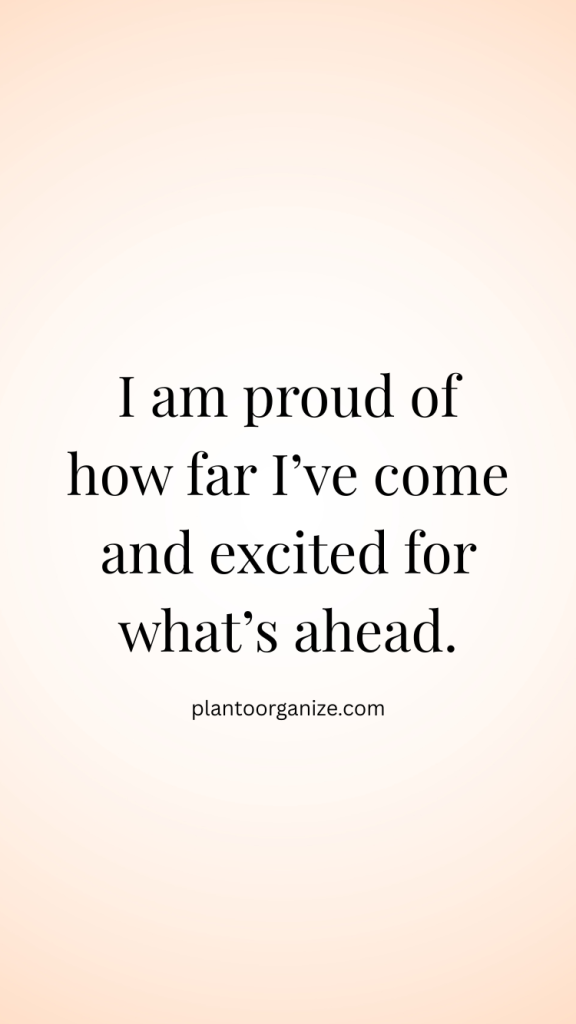 Happy woman looking in the mirror and reciting confidence affirmations.