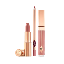 Charlotte Tilbury Pillow Talk Lip Kit featuring a lipstick and matching lip liner in soft pink shades, displayed neatly on a clean surface, highlighting a luxurious and flattering lip set.