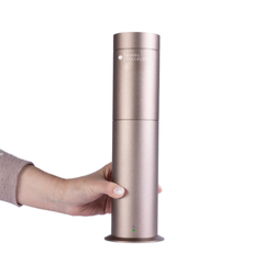 Perfume Genie Diffuser by Rituals in an elegant bottle with minimalist design, displayed on a clean surface, highlighting its stylish home fragrance solution for a luxurious and aromatic atmosphere.