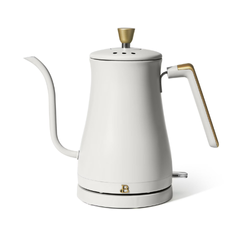 Modern electric kettle in a sleek design, displayed on a clean surface, highlighting its functionality for quickly boiling water and adding convenience to the kitchen.