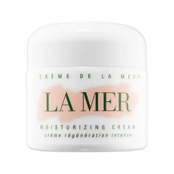 Luxury jar of La Mer moisturizing cream in a white container with minimalist design, known for its rich, hydrating formula, showcased as a premium Christmas gift.