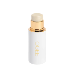 OGEE Sculpted Face Stick in a sleek, cylindrical design, displayed on a clean surface, highlighting its contouring and highlighting formula for sculpted, radiant facial features.