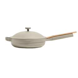 Our Place Always Pan 2.0 in a pastel color, displayed on a clean surface, highlighting its versatile, non-stick design for cooking a variety of dishes with style and functionality.