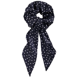 Boden scarf scrunchie featuring a colorful patterned fabric, displayed on a clean surface, highlighting its stylish and versatile design for hair or wrist accessory.