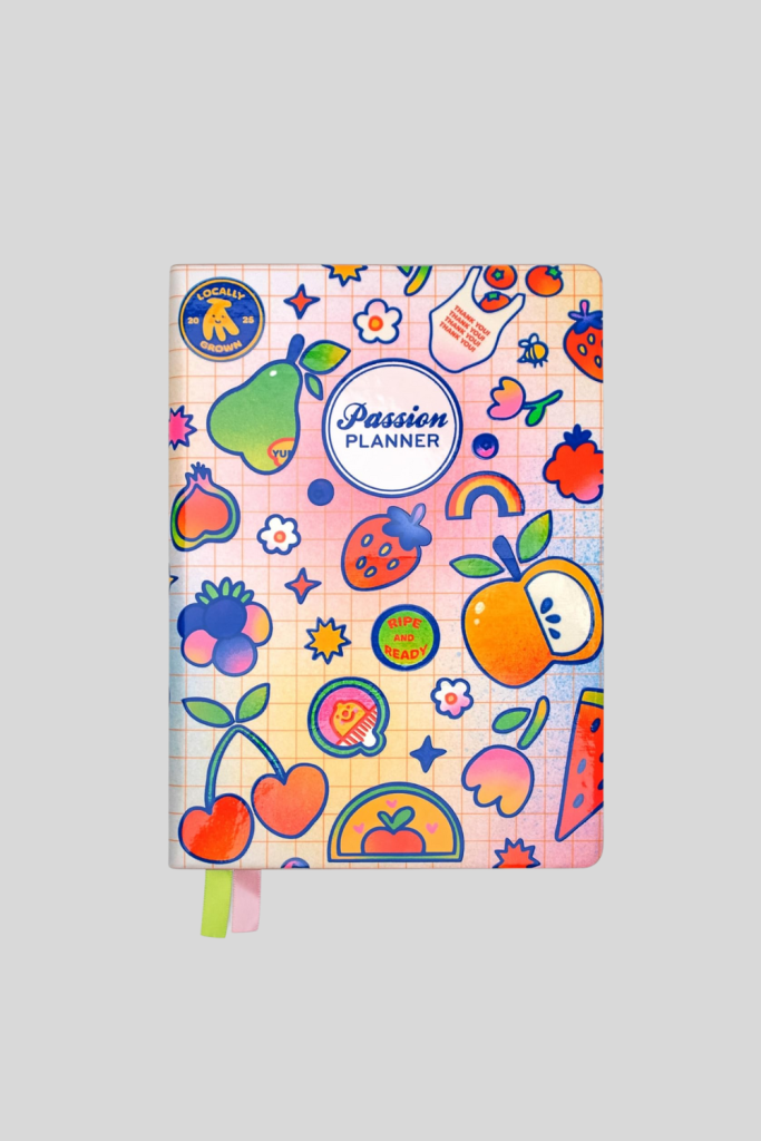 Passion Planner 2026 β hardcover planner with minimalist design and gold-embossed year on the cover.