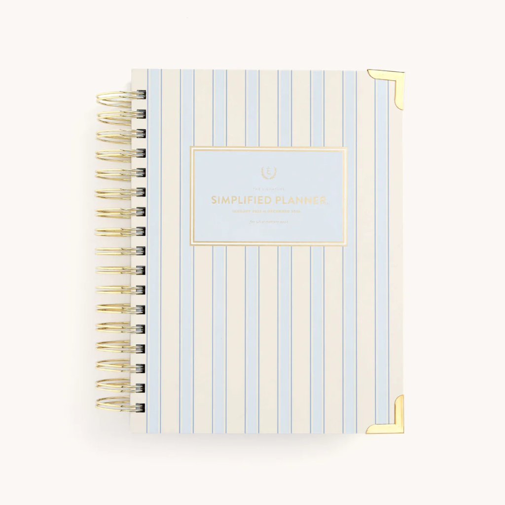 Simplified Planner open to a clean daily layout with sections for schedule, priorities, to-do lists, and notes, designed for productivity, organization, and intentional planning.