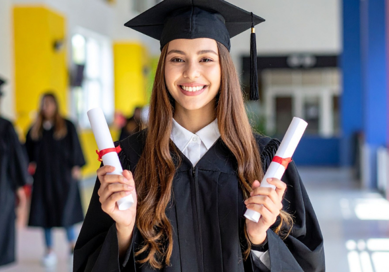 image of woman graduating and happy about her success.